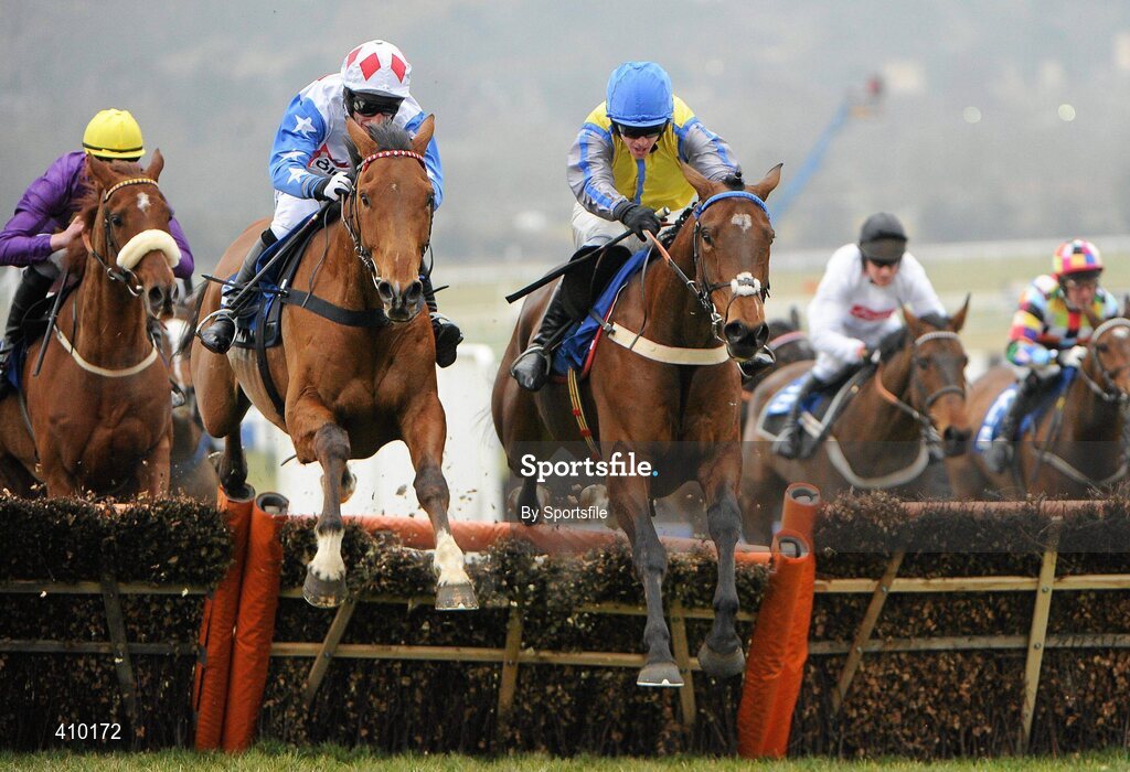 17 March 2010; Peddlers Cross, right, with Jason Maguire up, jumps the last on their way to winning the Neptune Investment Management Novices' Hurdle ahead of Reve de Sivola, with Daryl Jacob up. Cheltenham Racing Festival - Wednesday. Prestbury Park, Cheltenham, Gloucestershire, England. Photo by Sportsfile