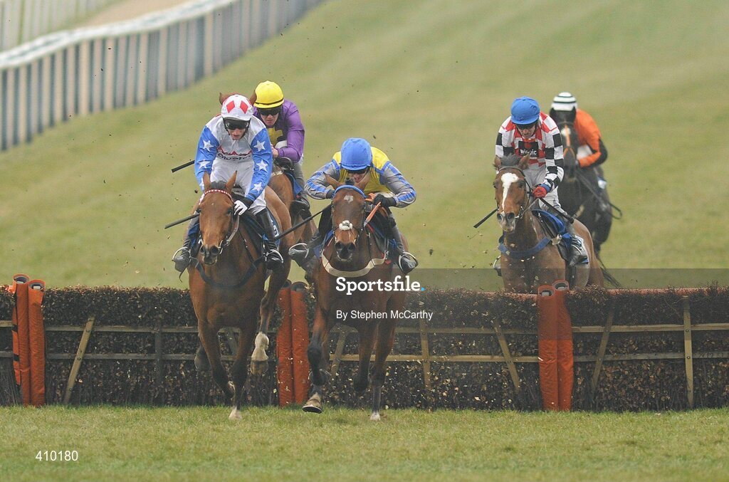 17 March 2010; Peddlers Cross, with Jason Maguire up, blue, yellow and grey silks, jumps the last ahead of second place Reve de Sivola, with Daryl Jacob up, left, and third place Rite of Passage, with Robbie McNamara up, purple and yellow silks, on their way to wiinning the Neptune Investment Management Novices' Hurdle. Cheltenham Racing Festival - Wednesday. Prestbury Park, Cheltenham, Gloucestershire, England. Picture credit: Stephen McCarthy / SPORTSFILE
