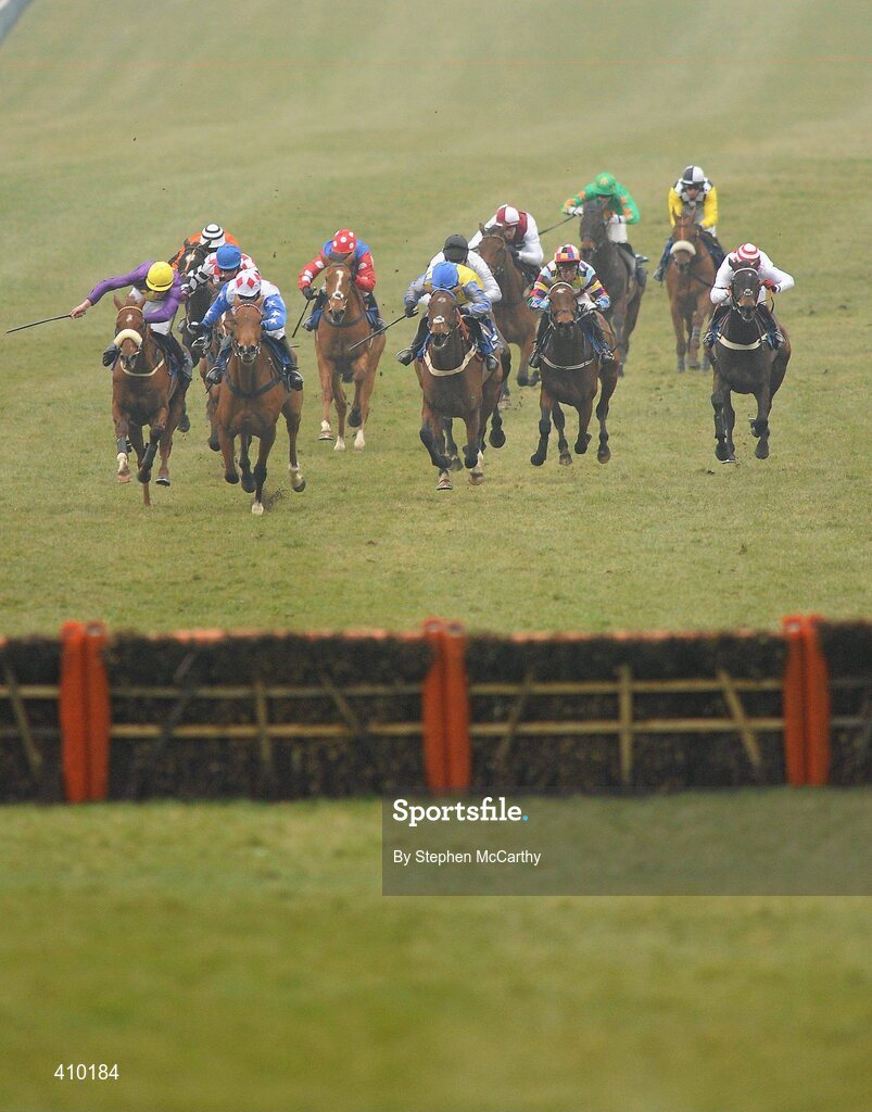17 March 2010; Runners and riders approach the last during the Neptune Investment Management Novices' Hurdle. Cheltenham Racing Festival - Wednesday. Prestbury Park, Cheltenham, Gloucestershire, England. Picture credit: Stephen McCarthy / SPORTSFILE