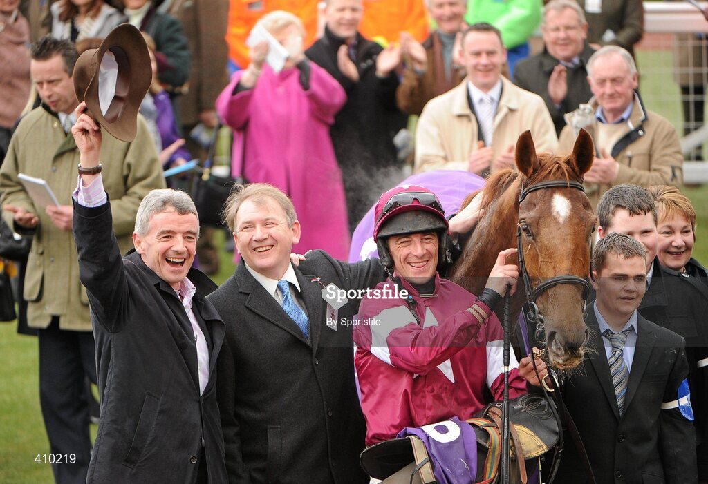 17 March 2010; Michael O'Leary, left, member of the winning connections of Weapon's Amnesty with trainer Charles Byrnes and jockey Davey Russell after winning the RSA Chase. Cheltenham Racing Festival - Wednesday. Prestbury Park, Cheltenham, Gloucestershire, England. Photo by Sportsfile