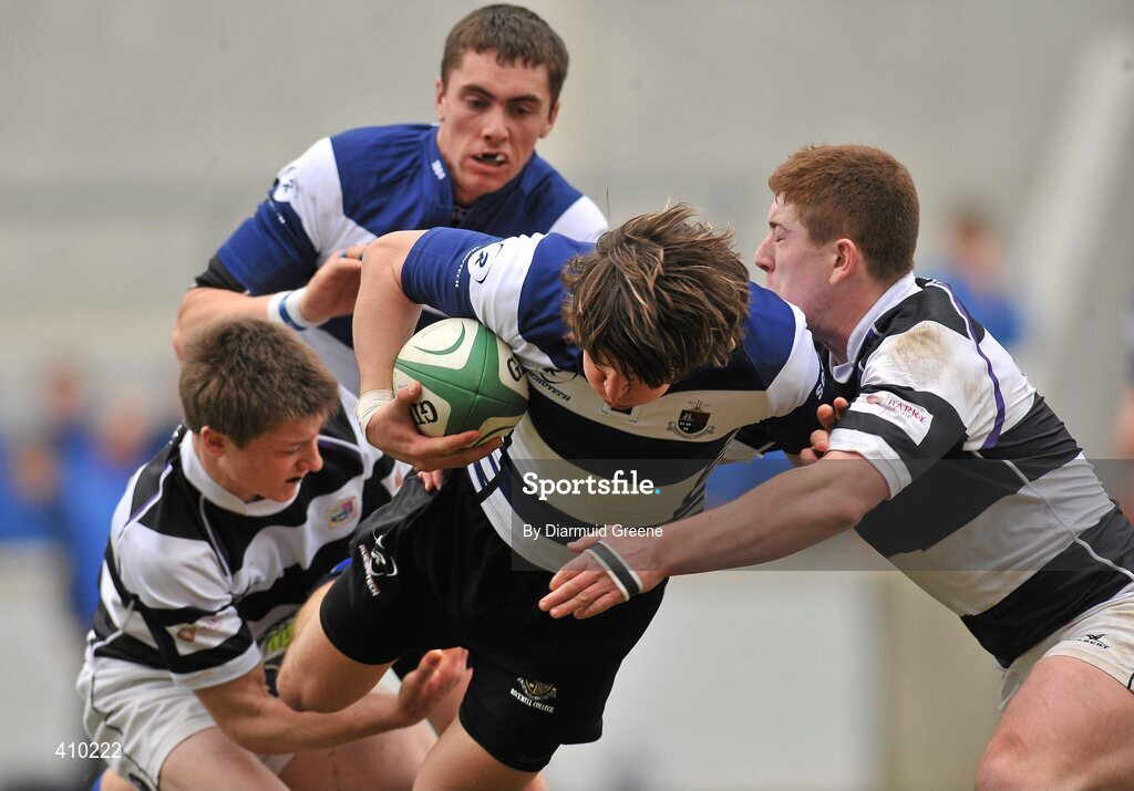 17 March 2010; Harry McNulty, Rockwell College, is tackled by Jack Costigan, left, and Daniel Horgan, PBC. Munster Schools Senior Cup Final, Rockwell College v PBC, Thomond Park, Limerick. Picture credit: Diarmuid Greene / SPORTSFILE