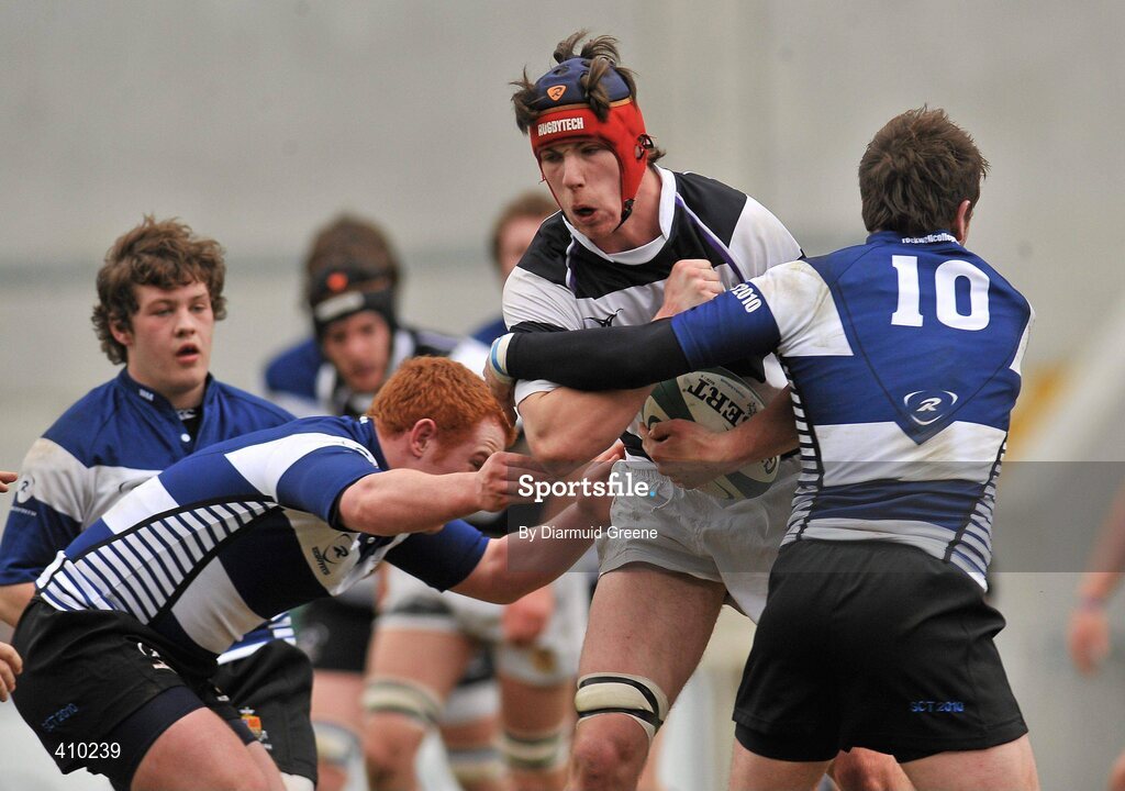 17 March 2010; Cathal O'Flaherty, PBC, is tackled by Tom Doyle, left, and JJ Hanrahan, Rockwell College. Munster Schools Senior Cup Final, Rockwell College v PBC, Thomond Park, Limerick. Picture credit: Diarmuid Greene / SPORTSFILE