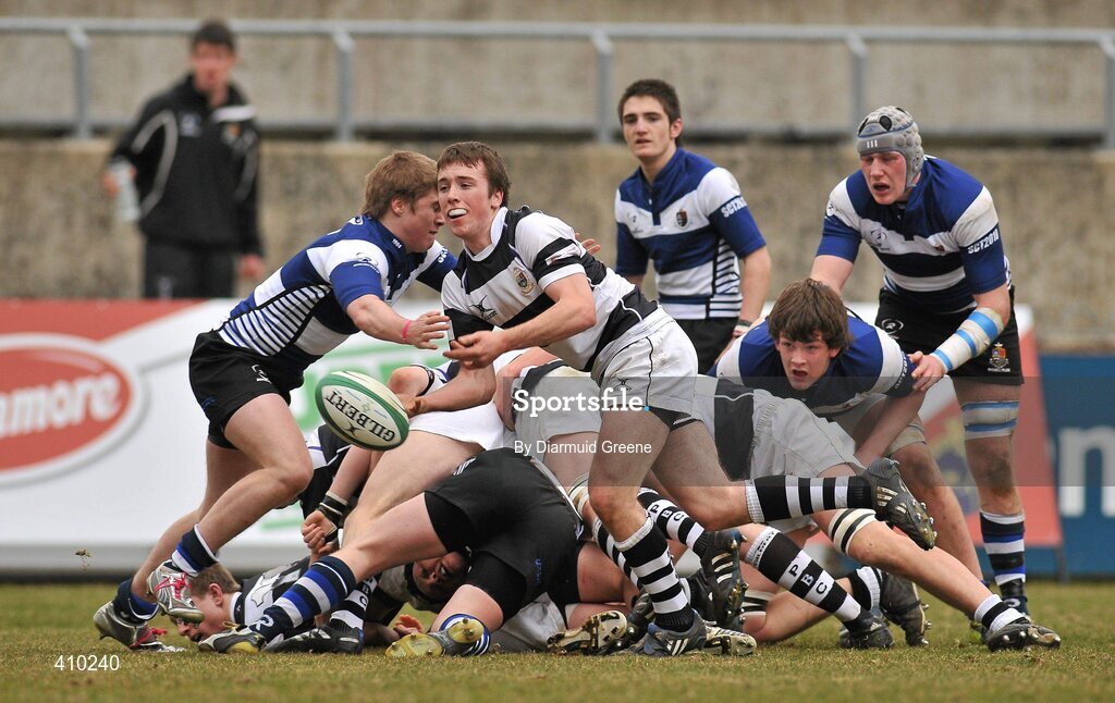 17 March 2010; Ronan Barry, PBC, gets the ball away from the scrum as he is tackled by Donagh McGillycuddy, Rockwell College. Munster Schools Senior Cup Final, Rockwell College v PBC, Thomond Park, Limerick. Picture credit: Diarmuid Greene / SPORTSFILE