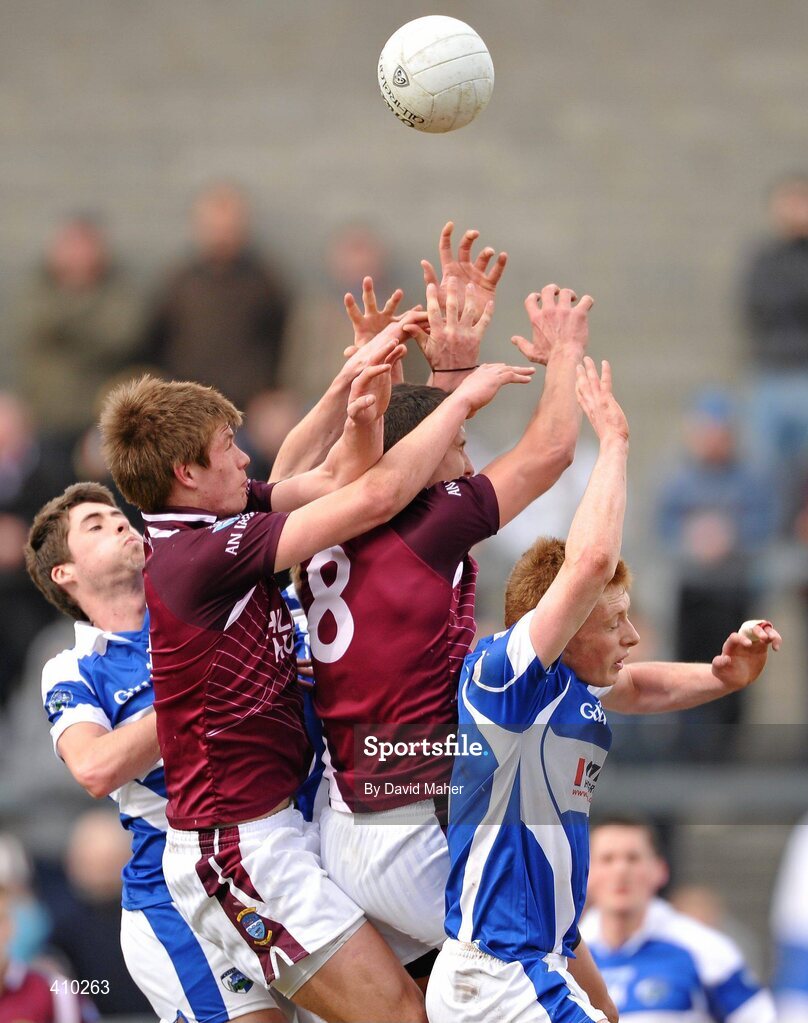 17 March 2010; Denis Corroon, no. 8, and John Heslin, Westmeath, in action against Conor Boyle, left, and Brian Glynn, Laois. Cadbury Leinster GAA Football Under 21 Semi-Final, Westmeath v Laois, Cusack Park, Mullingar, Co. Westmeath. Picture credit: David Maher / SPORTSFILE