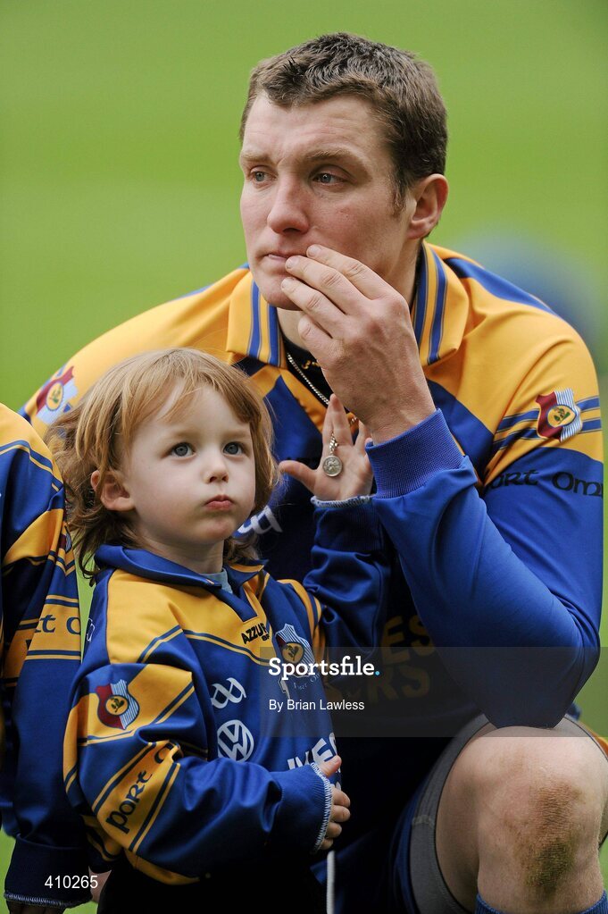 17 March 2010; Portumna goalkeeper Ivan Canning with his son Andrew, age 3, after defeat in the final. AIB GAA Hurling All-Ireland Senior Club Championship Final, Ballyhale Shamrocks v Portumna, Croke Park, Dublin. Picture credit: Brian Lawless / SPORTSFILE