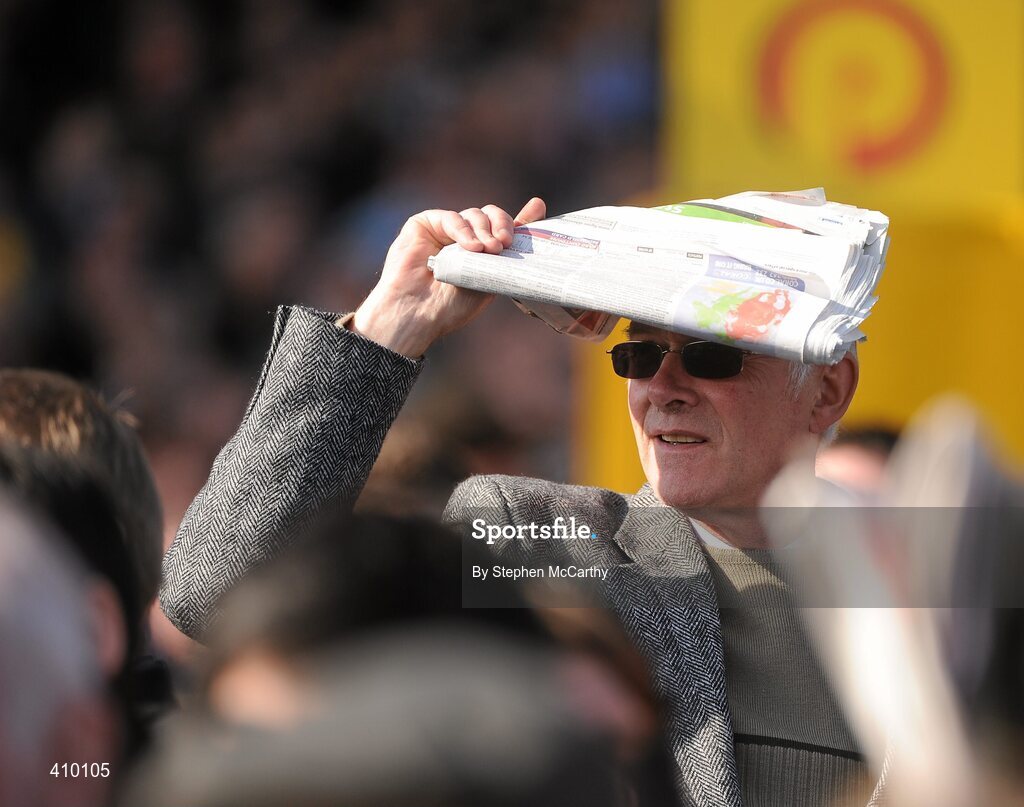 16 March 2010; A bookie watches on during the Spinal Research Supreme Novices' Hurdle. Cheltenham Racing Festival - Tuesday. Prestbury Park, Cheltenham, Gloucestershire, England. Picture credit: Stephen McCarthy / SPORTSFILE