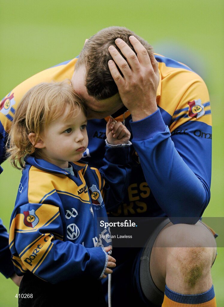 17 March 2010; Portumna goalkeeper Ivan Canning with his son Andrew, age 3, after defeat in the final. AIB GAA Hurling All-Ireland Senior Club Championship Final, Ballyhale Shamrocks v Portumna, Croke Park, Dublin. Picture credit: Brian Lawless / SPORTSFILE