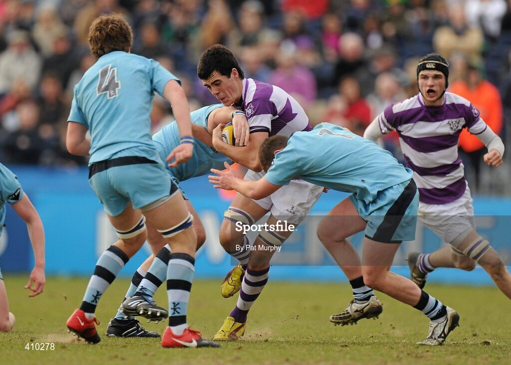 17 March 2010; Jordan Coughlan, Clongowes Wood College SJ, in action against, from left, Shane O'Connor, David Reynolds and Karl Duffy, St. Michael's College. Leinster Schools Senior Cup Final, Clongowes Wood College SJ v St. Michael's College. RDS, Ballsbridge, Dublin. Picture credit: Pat Murphy / SPORTSFILE