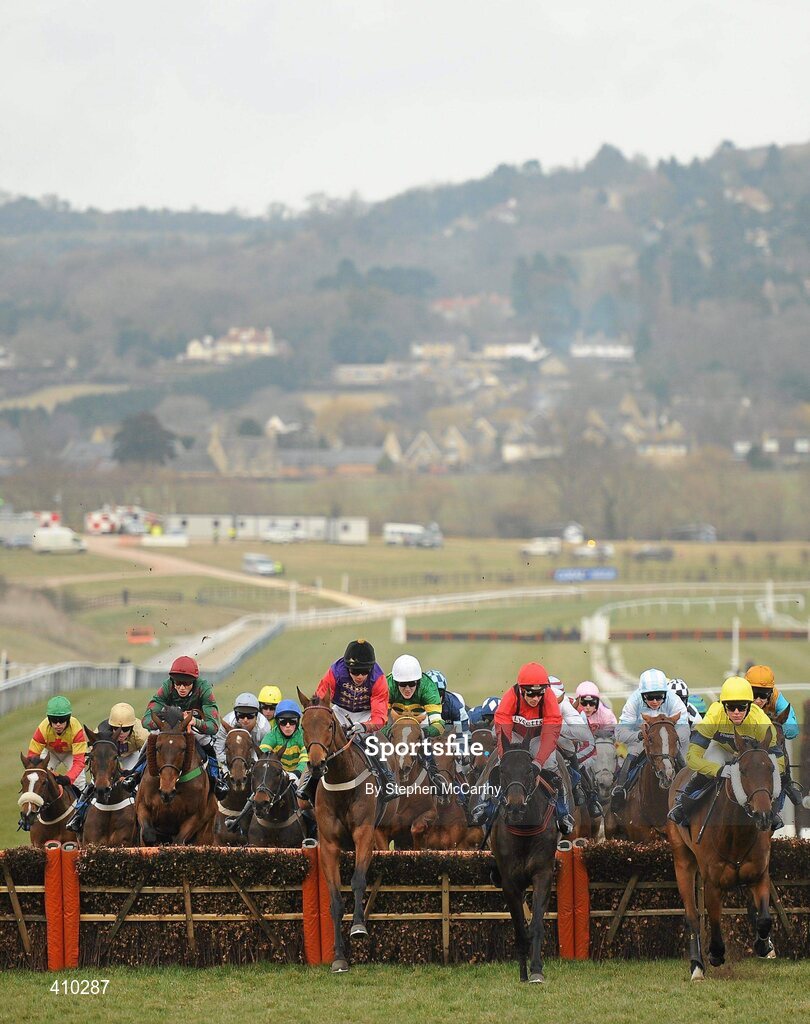 17 March 2010; The runners and riders jump the last first time around during the Coral Cup. Cheltenham Racing Festival - Wednesday. Prestbury Park, Cheltenham, Gloucestershire, England. Picture credit: Stephen McCarthy / SPORTSFILE