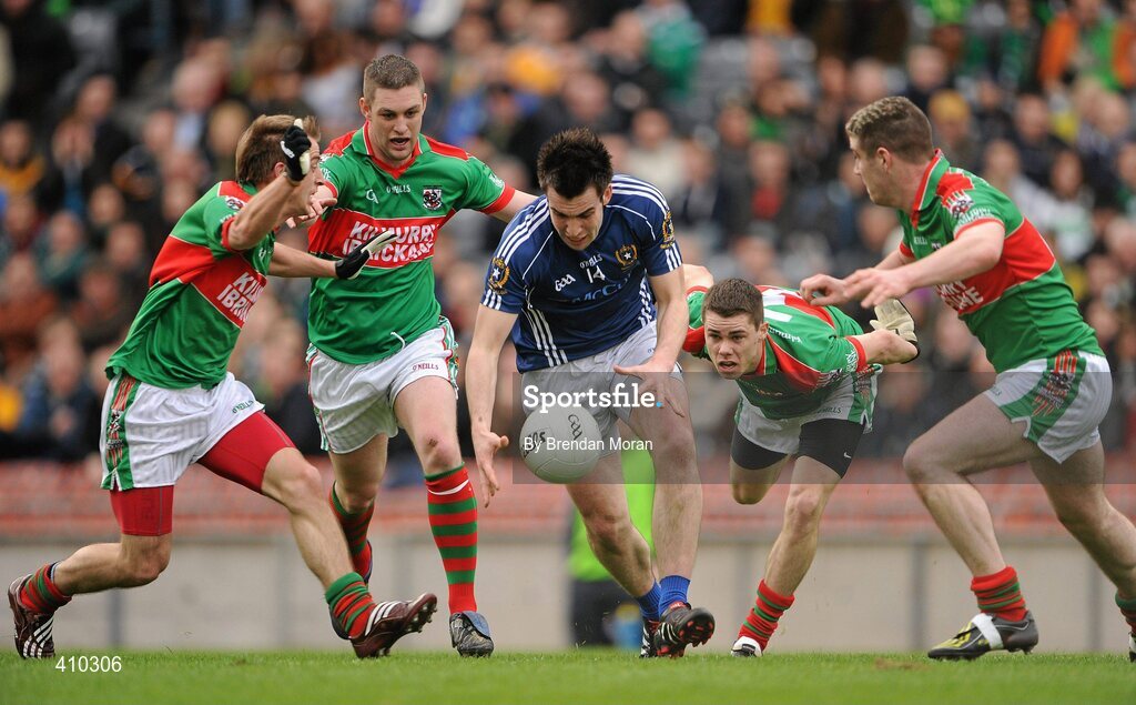 17 March 2010; Kevin Niblock, St Gall's, in action against Kilmurry Ibrickane players, from left, Declan Callinan, Enda Coughlan, Mark Killeen and Darren Hickey. AIB GAA Football All-Ireland Senior Club Championship Final, Kilmurry Ibrickane v St Gall's, Croke Park, Dublin. Picture credit: Brendan Moran / SPORTSFILE