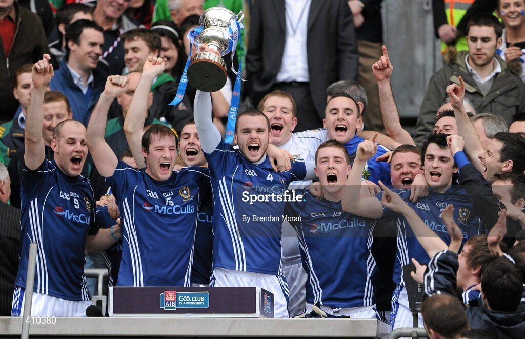 17 March 2010; St Gall's captain Colin Brady, centre, and team-mates, from left, Aodhan Gallagher, Kieran McGourty, Karl Stewart and Paul Veronica celebrate with the Andy Merrigan cup after the game. AIB GAA Football All-Ireland Senior Club Championship Final, Kilmurry Ibrickane v St Gall's, Croke Park, Dublin. Picture credit: Brendan Moran / SPORTSFILE
