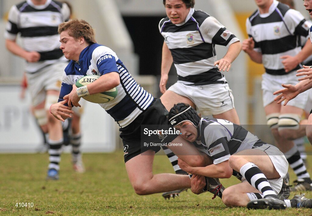 17 March 2010; Donach McGillycuddy, Rockwell College, is tackled by Sean Og Murphy, PBC. Munster Schools Senior Cup Final, Rockwell College v PBC, Thomond Park, Limerick. Picture credit: Diarmuid Greene / SPORTSFILE