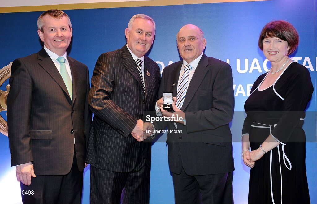 16 March 2009; Paddy Fitzgerald, Dungarvan GAA Club, Co. Waterford, is presented with a GAA President's Award by Uachtarán CLG Criostóir Ó Cuana, in the company of Pol O Gallchoir, TG4, and Joanne Lee, Head of Internal Cummunications, AIB. Paddy played a key role in the acquisition of a 22-acre land bank at Clogherane in 1988 and in its subsequent development. He served for a time as club Vice Chairman before being elected Chairman, a position he remained in for 14 years. GAA President’s Awards 2010, Croke Park, Dublin. Picture credit: Brendan Moran / SPORTSFILE