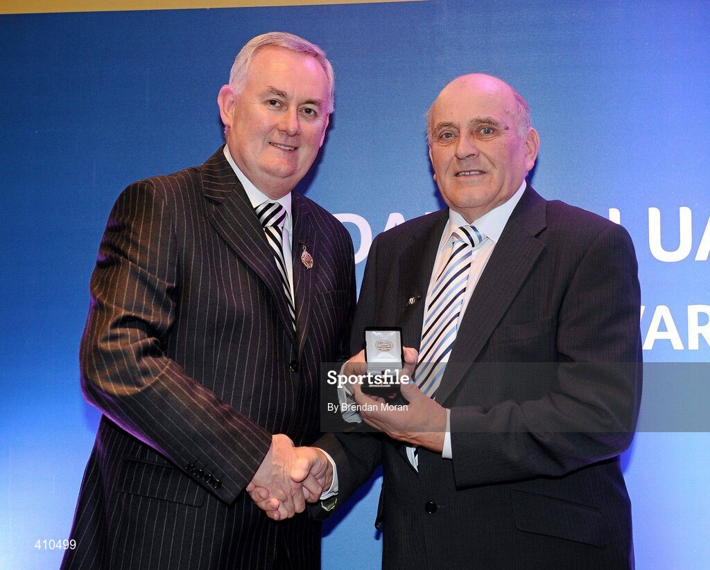 16 March 2009; Paddy Fitzgerald, Dungarvan GAA Club, Co. Waterford, is presented with a GAA President's Award by Uachtarán CLG Criostóir Ó Cuana. Paddy played a key role in the acquisition of a 22-acre land bank at Clogherane in 1988 and in its subsequent development. He served for a time as club Vice Chairman before being elected Chairman, a position he remained in for 14 years. GAA President’s Awards 2010, Croke Park, Dublin. Picture credit: Brendan Moran / SPORTSFILE