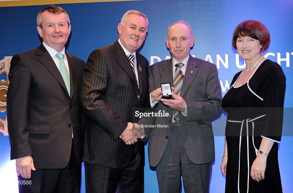 16 March 2009; Jim McGiven, St Mary’s GAA Club, Burren, Co. Down, is presented with a GAA President's Award by Uachtarán CLG Criostóir Ó Cuana, in the company of Pol O Gallchoir, Ceannsai, TG4 and Joanne Lee, Head of Internal Cummunications, AIB. Jim has given an enormous amount of his time in a voluntary capacity to ensure projects undertaken were delivered on time, under budget and to the highest standards. Jim has been a Club Committee member since 1975, represents the club on the County Committee and has held the position of Treasurer since 1999. GAA President’s Awards 2010, Croke Park, Dublin. Picture credit: Brendan Moran / SPORTSFILE