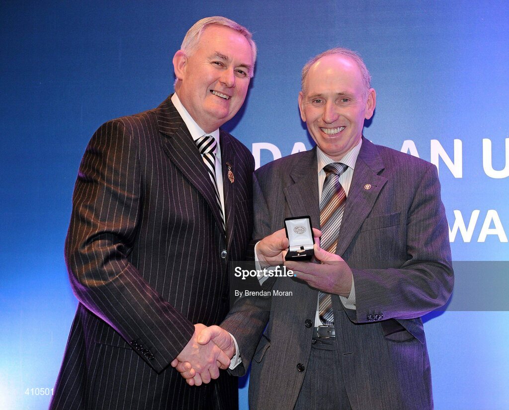 16 March 2009; Jim McGiven, St Mary’s GAA Club, Burren, Co. Down, is presented with a GAA President's Award by Uachtarán CLG Criostóir Ó Cuana. Jim has given an enormous amount of his time in a voluntary capacity to ensure projects undertaken were delivered on time, under budget and to the highest standards. Jim has been a Club Committee member since 1975, represents the club on the County Committee and has held the position of Treasurer since 1999. GAA President’s Awards 2010, Croke Park, Dublin. Picture credit: Brendan Moran / SPORTSFILE