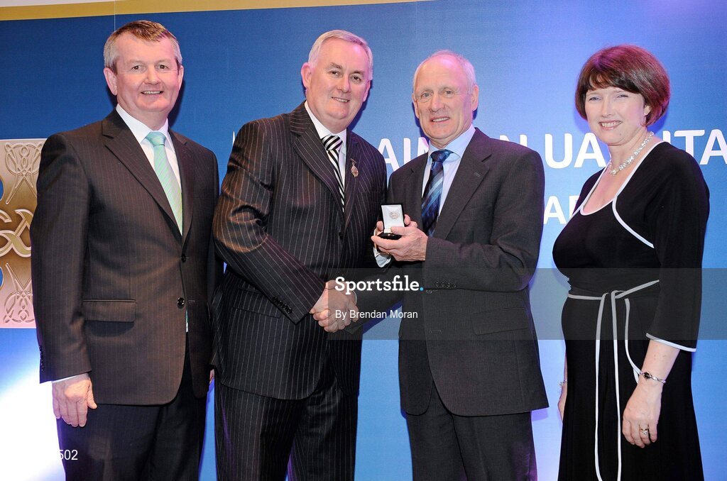 16 March 2009; Patsy Forbes, O’Donovan Rossa GAA Club, Ardboe, Co. Tyrone, is presented with a GAA President's Award by Uachtarán CLG Criostóir Ó Cuana, in the company of Pol O Gallchoir, Ceannsai, TG4 and Joanne Lee, Head of Internal Cummunications, AIB. Patsy has been at the centre of GAA affairs in his club since he was 16 years old and is currently a club trustee. He has been there in administration for over 30 years. GAA President’s Awards 2010, Croke Park, Dublin. Picture credit: Brendan Moran / SPORTSFILE