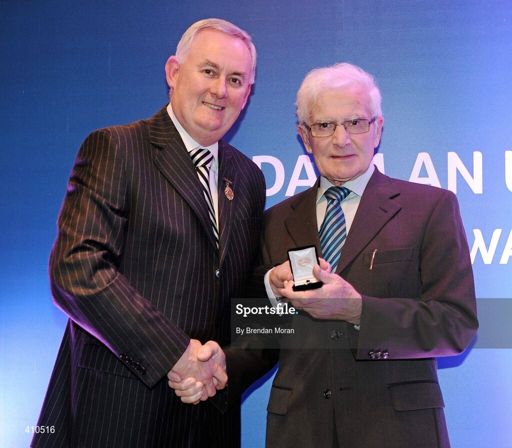 16 March 2009; Tommy McLoughlin, Wolfe Tones GAA Club, Co. Longford, is presented with a GAA President's Award by Uachtarán CLG Criostóir Ó Cuana. Tommy became Club Secretary in 1969 through until 1976. During his term, he oversaw the development of the Club’s pitch and dressing rooms. He also resumed his previous role as county board delegate, which is a position he holds to this day. GAA President’s Awards 2010, Croke Park, Dublin. Picture credit: Brendan Moran / SPORTSFILE