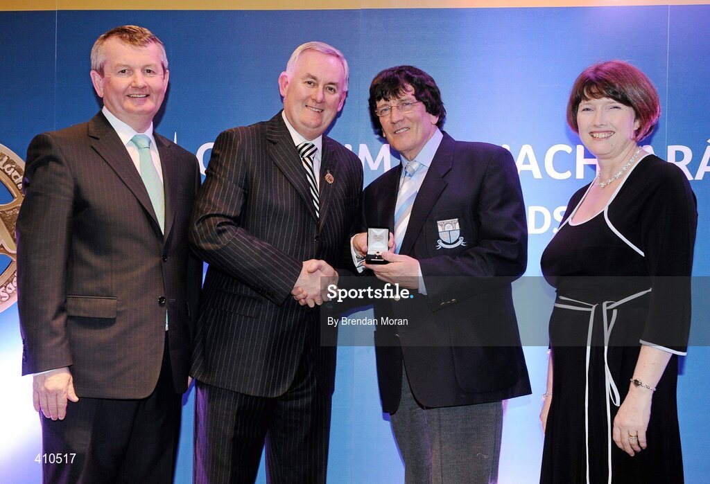 16 March 2009; Charlie McAlester, Newtown Blues GAA Club, Co. Louth, is presented with a GAA President's Award by Uachtarán CLG Criostóir Ó Cuana, in the company of Pol O Gallcjhoir, TG4 and Joanne Lee, Head of Internal Cummunications, AIB. For 39 years, Charlie had seen to it that Louth County teams of all levels were togged out to the very best standards. His standing in the world of the GAA has been perfectly demonstrated over the past 11 months during his battle with serious illness. It was with regret that Charlie had to give up his job as Louth kitman but his interest in Wee County teams remains strong. GAA President’s Awards 2010, Croke Park, Dublin. Picture credit: Brendan Moran / SPORTSFILE