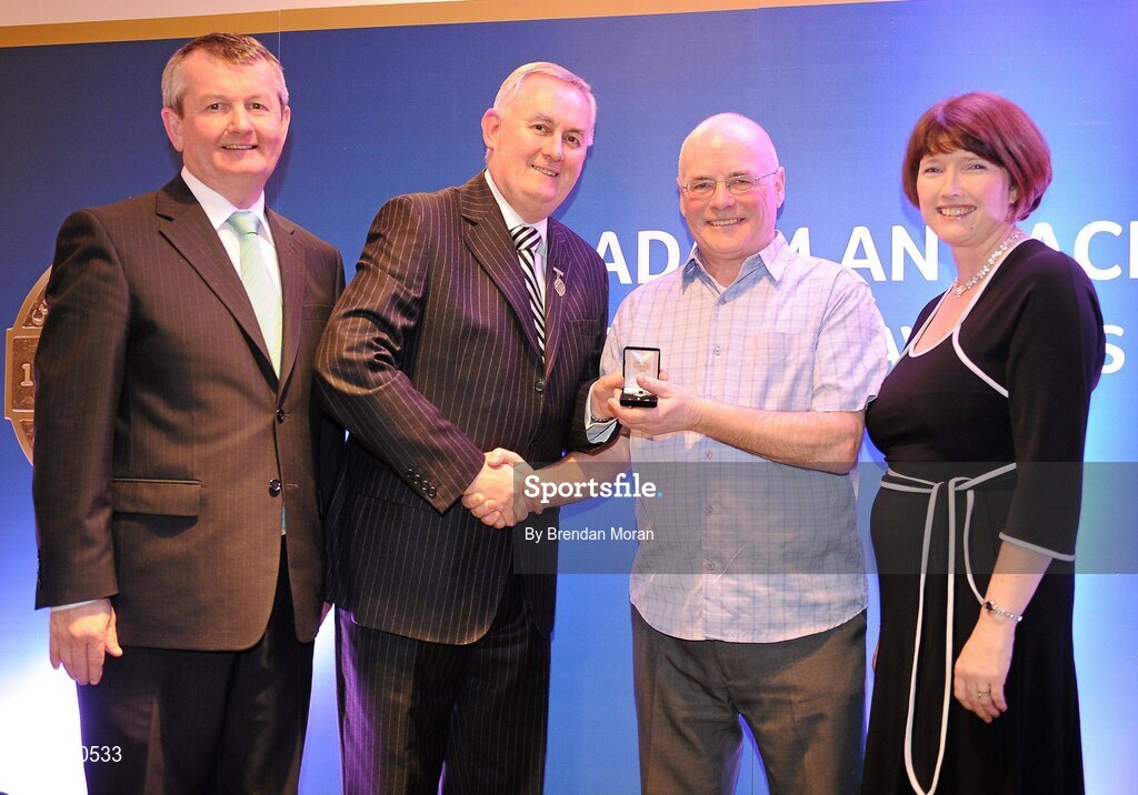 16 March 2009; Christopher Hughes Snr, Limekiln Rounders GAA Club, Dublin, is presented with a GAA President's Award by Uachtarán CLG Criostóir Ó Cuana, in the company of Pol O Gallchoir, Ceannsai, TG4, and Joanne Lee, Head of Internal Cummunications, AIB. Christy has been involved with both GAA Rounders and the Community Games for over 30 years. The Limekiln Club has children and adults competing at all levels of competition with numerous successes. GAA President’s Awards 2010, Croke Park, Dublin. Picture credit: Brendan Moran / SPORTSFILE