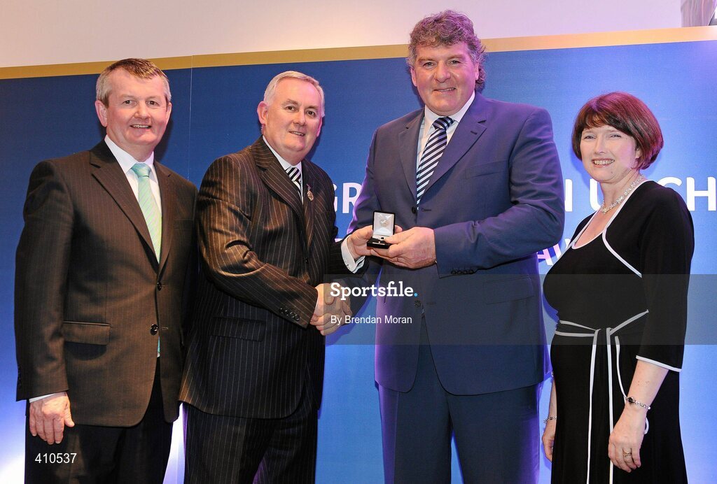 16 March 2009; John Hughes, Geevagh GAA Club, Co. Sligo, is presented with a GAA President's Award by Uachtarán CLG Criostóir Ó Cuana, in the company of Pol O Gallchoir, TG4, and Joanne Lee, Head of Internal Cummunications, AIB. For many years in Sligo, John Hughes has become renowned for his work in his home parish of Geevagh and the Cumann na mBunscol organisation in Sligo. He has been come to be known as ‘Mr. Cumann na mBunscol’ in the county. GAA President’s Awards 2010, Croke Park, Dublin. Picture credit: Brendan Moran / SPORTSFILE