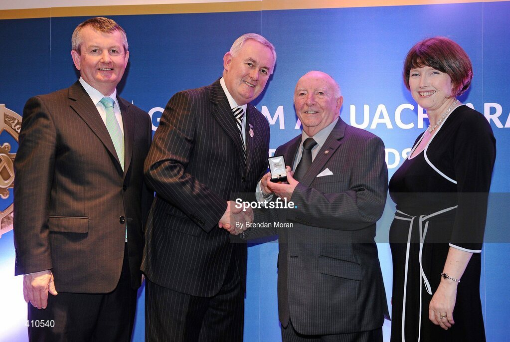 17 March 2009; Harry Mc Evoy, Carryduff GAC, Down, is presented with a GAA President's Award by Uachtarán CLG Criostóir Ó Cuana, in the company of Pol O Gallchoir, Ceannsai, TG4, and Joanne Lee, Head of Internal Cummunications, AIB. Harry was a founder member of Dumaness and Carryduff and also served as Secretary and Chairman of the East Down Divisional Committee. He has been deeply involved in the promotion and presentation of Scór at the county, provincial and central level. GAA President’s Awards 2010, Croke Park, Dublin. Picture credit: Brendan Moran / SPORTSFILE