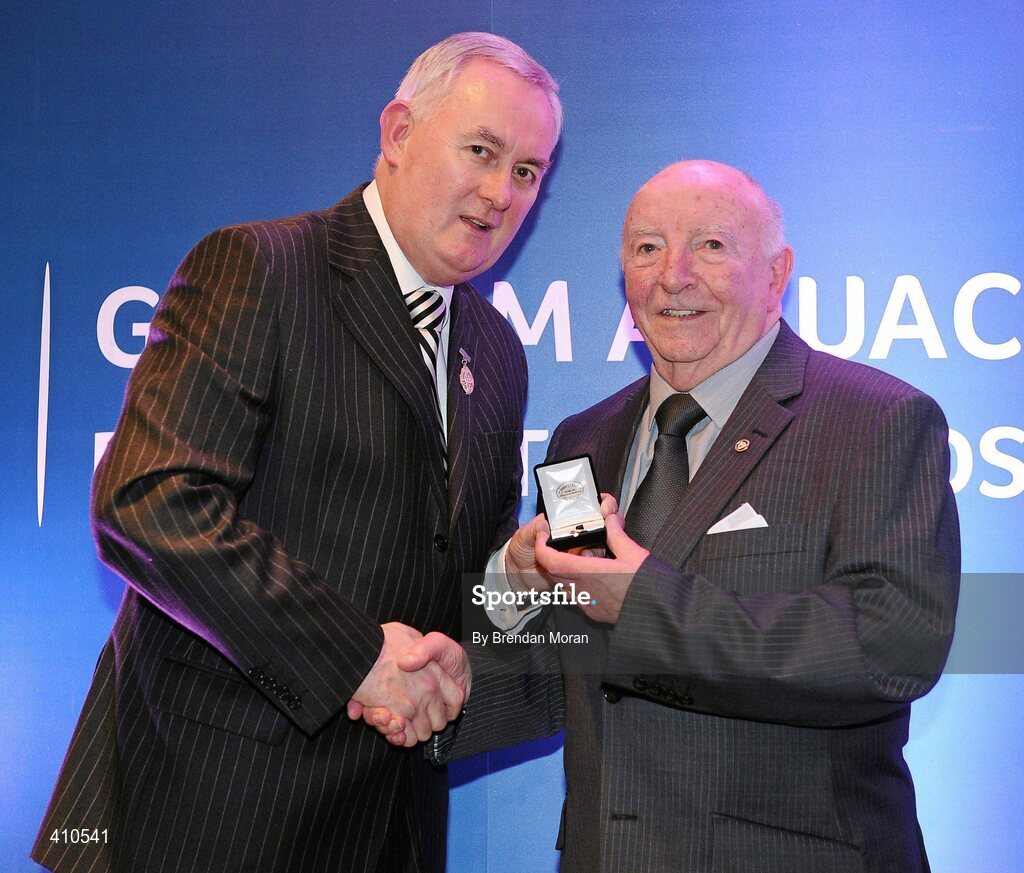 17 March 2009; Harry Mc Evoy, Carryduff GAC, Down, is presented with a GAA President's Award by Uachtarán CLG Criostóir Ó Cuana. Harry was a founder member of Dumaness and Carryduff and also served as Secretary and Chairman of the East Down Divisional Committee. He has been deeply involved in the promotion and presentation of Scór at the county, provincial and central level. GAA President’s Awards 2010, Croke Park, Dublin. Picture credit: Brendan Moran / SPORTSFILE