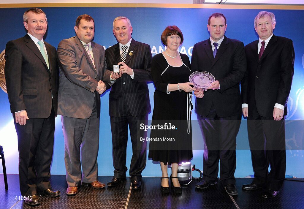 16 March 2009; Eamonn O'Neill, left, Chairman of the 125 Committee in Ballylanders GAA Club, Co. Limerick, and Pa Meade, 2nd from right, Chairman of the Ballylanders GAA Club, Co. Limerick, receive a special GAA President's Award from Uachtarán CLG Criostóir Ó Cuana and Joanne Lee, Head of Internal Cummunications, AIB, in the company of Pol O Gallchoir, left, Ceannsai, TG4, and Páraic Duffy, Ard Stiúrthóir of the GAA. Ballylanders Shamrocks, as the Club was then known, was founded in 1886. The Club’s 125 Anniversary celebrations focused of the enormous contribution made by the founder of the club, Frank B Dineen, in the emergence of the GAA. He is the only man to serve as both Secretary and President of the Association, and bought the site on Jones’s Road where Croke Park now stands. GAA President’s Awards 2010, Croke Park, Dublin. Picture credit: Brendan Moran / SPORTSFILE