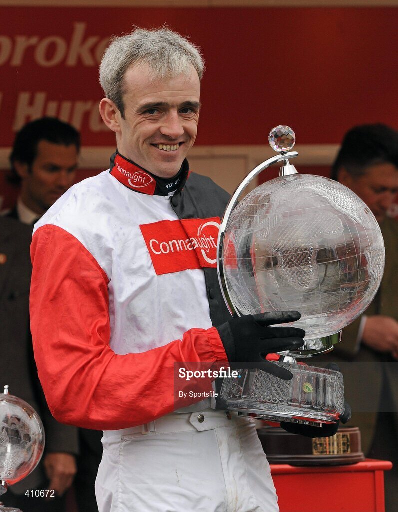 18 March 2010; Jockey Ruby Walsh celebrates with the trophy after winning the Ladbrokes World Hurdle on Big Buck's. Cheltenham Racing Festival - Thursday. Prestbury Park, Cheltenham, Gloucestershire, England. Photo by Sportsfile