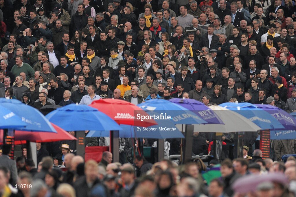 18 March 2010; Punters watch on during the Fulke Walwyn Kim Muir Challenge Cup Handicap Chase. Cheltenham Racing Festival - Thursday. Prestbury Park, Cheltenham, Gloucestershire, England. Picture credit: Stephen McCarthy / SPORTSFILE