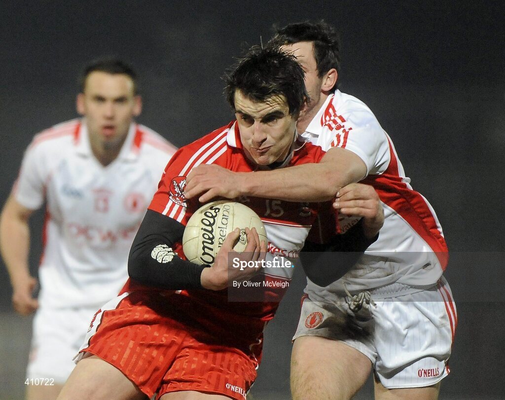 10 March 2010; Lee Kennedy, Derry, in action against Ronan McNabb, Tyrone. Cadbury Ulster GAA Football Under 21 Championship preliminary Round, Tyrone v Derry, Healy Park, Omagh, Co. Tyrone. Picture credit: Oliver McVeigh / SPORTSFILE