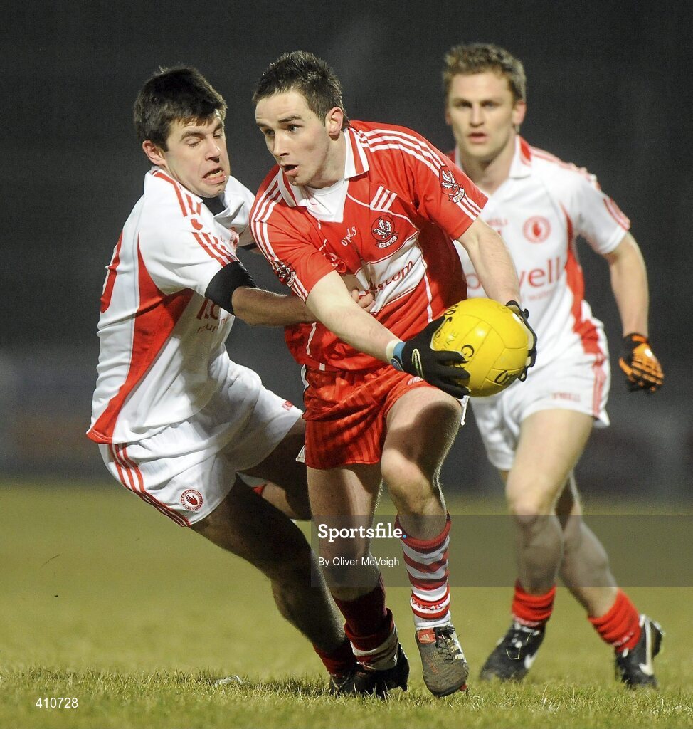 10 March 2010; Lee Moore, Derry, in action against Kieran Gervin, Tyrone. Cadbury Ulster GAA Football Under 21 Championship preliminary Round, Tyrone v Derry, Healy Park, Omagh, Co. Tyrone. Picture credit: Oliver McVeigh / SPORTSFILE