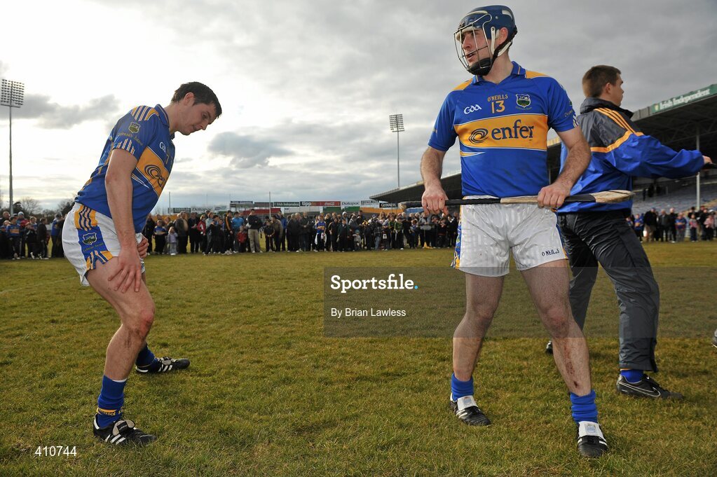 14 March 2010; Tipperary's Eoin Kelly and Seamus Callanan, left, warm down as a crowd of onlookers gather. Allianz GAA Hurling National League, Division 1, Round 3, Tipperary v Galway, Semple Stadium, Thurles, Co. Tipperary. Picture credit: Brian Lawless / SPORTSFILE