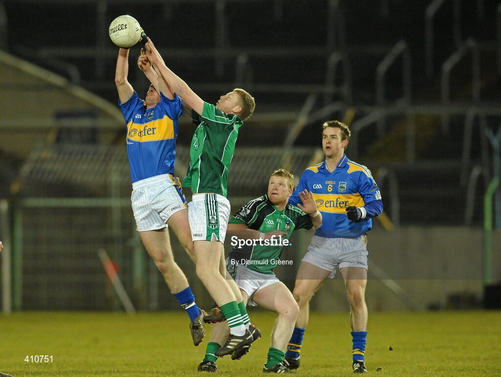 18 March 2010; Peter Acheson, Tipperary, in action against Tony McMahon, Limerick. Cadbury Munster GAA Football Under 21 Championship Semi-Final, Tipperary v Limerick, Semple Stadium, Thurles, Co. Tipperary. Picture credit: Diarmuid Greene / SPORTSFILE
