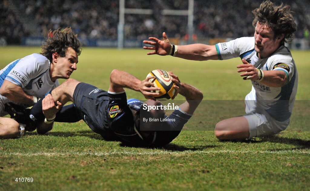 18 March 2010; Girvan Dempsey, Leinster, goes over for his side's second try despite the efforts of Peter Horne, right, and Bernardo Stortoni, Glasgow Warriors. Celtic League, Leinster v Glasgow Warriors, RDS, Ballsbridge, Dublin. Picture credit: Brian Lawless / SPORTSFILE
