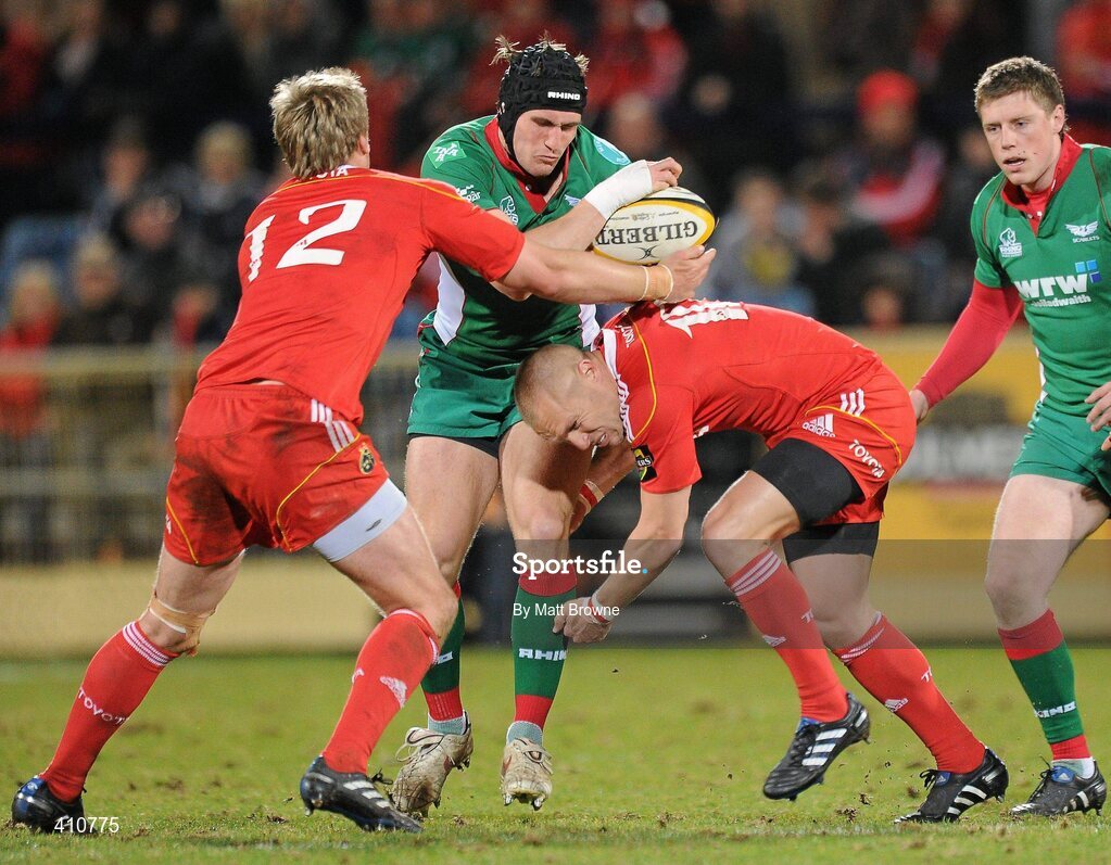 18 March 2010; Andy Fenby, Scarlets, is tackled by Jean de Villiers and Paul Warwick, Munster. Celtic League, Munster v Scarlets, Musgrave Park, Cork. Picture credit: Matt Browne / SPORTSFILE