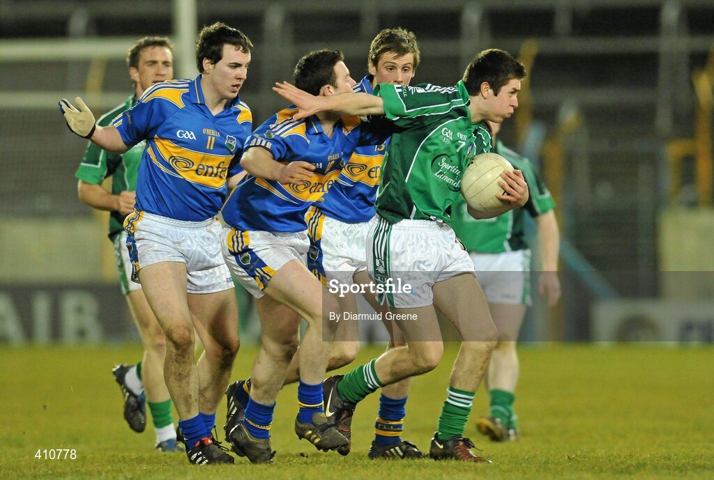18 March 2010; John Riordan, Limerick, in action against, from left, Bernard O'Brien, Sean Carey and Conor Sweeney, Tipperary. Cadbury Munster GAA Football Under 21 Championship  Semi-Final, Tipperary v Limerick, Semple Stadium, Thurles, Co. Tipperary. Picture credit: Diarmuid Greene / SPORTSFILE