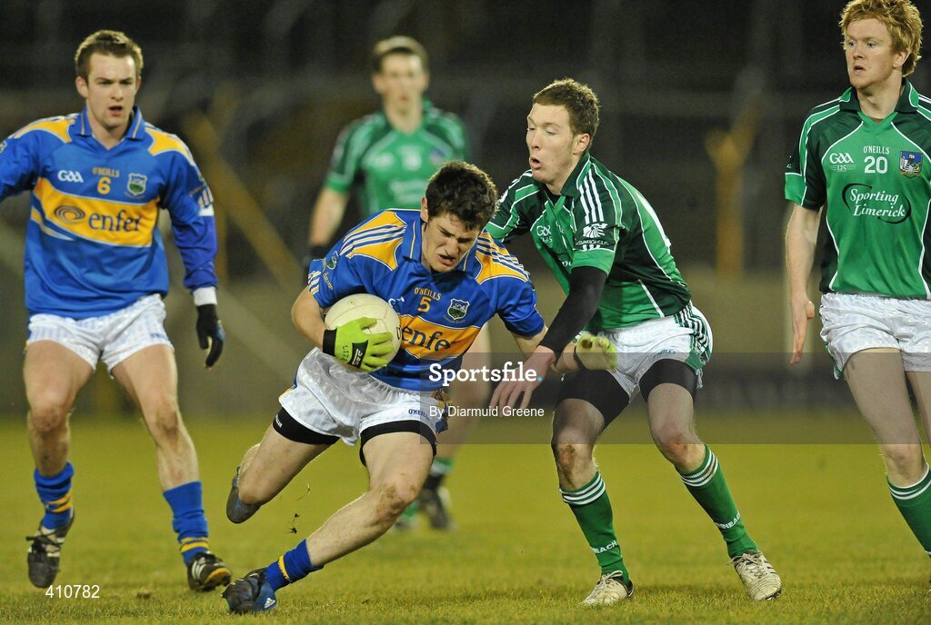 18 March 2010; Padraig O'Dwyer, Tipperary, in action against David Ward, Limerick. Cadbury Munster GAA Football Under 21 Championship Semi-Final, Tipperary v Limerick, Semple Stadium, Thurles, Co. Tipperary. Picture credit: Diarmuid Greene / SPORTSFILE