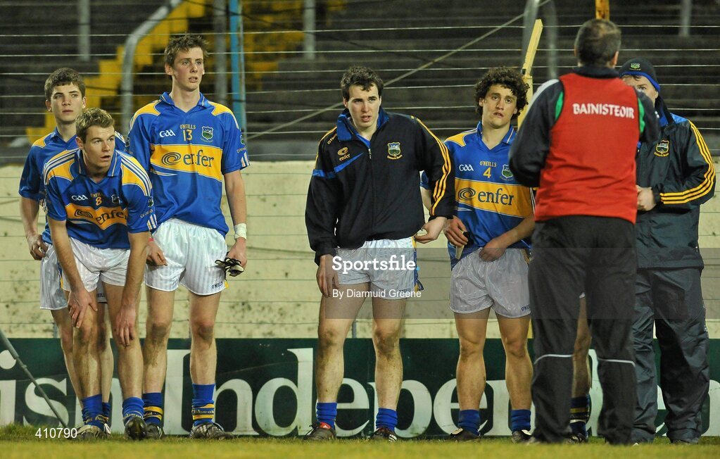 18 March 2010; Tipperary players listen to Limerick manager Maurice Horan as he speaks to them after the game. Cadbury Munster GAA Football Under 21 Championship Semi-Finall, Tipperary v Limerick, Semple Stadium, Thurles, Co. Tipperary. Picture credit: Diarmuid Greene / SPORTSFILE