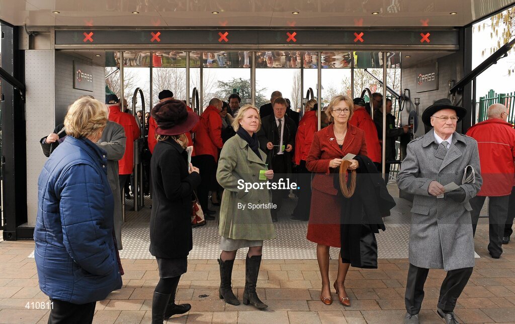 18 March 2010; Punters arriving in through the turnstiles. Cheltenham Racing Festival - Thursday. Prestbury Park, Cheltenham, Gloucestershire, England. Photo by Sportsfile