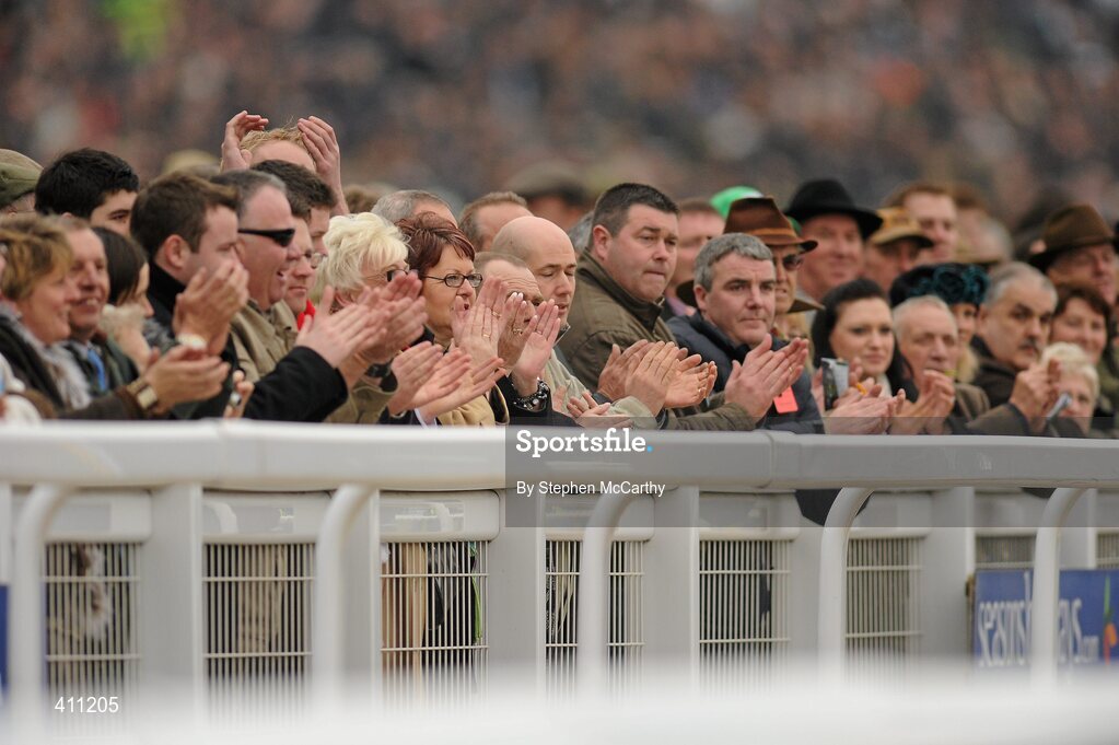 17 March 2010; Punters watch on during the 140th Year Of The National Hunt Chase Challenge Cup. Cheltenham Racing Festival - Wednesday. Prestbury Park, Cheltenham, Gloucestershire, England. Picture credit: Stephen McCarthy / SPORTSFILE