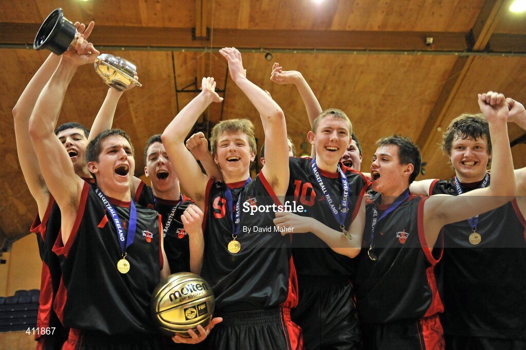 22 March 2010; Saint Eunans College captain Aodhan Hickey, holding the cup, celebrates with his team-mates after the game. U19B Boys - All-Ireland Schools League Finals 2010, Carrigaline Community School, Cork v Saint Eunans College, Letterkenny. National Basketball Arena, Tallaght, Dublin. Picture credit: David Maher / SPORTSFILE