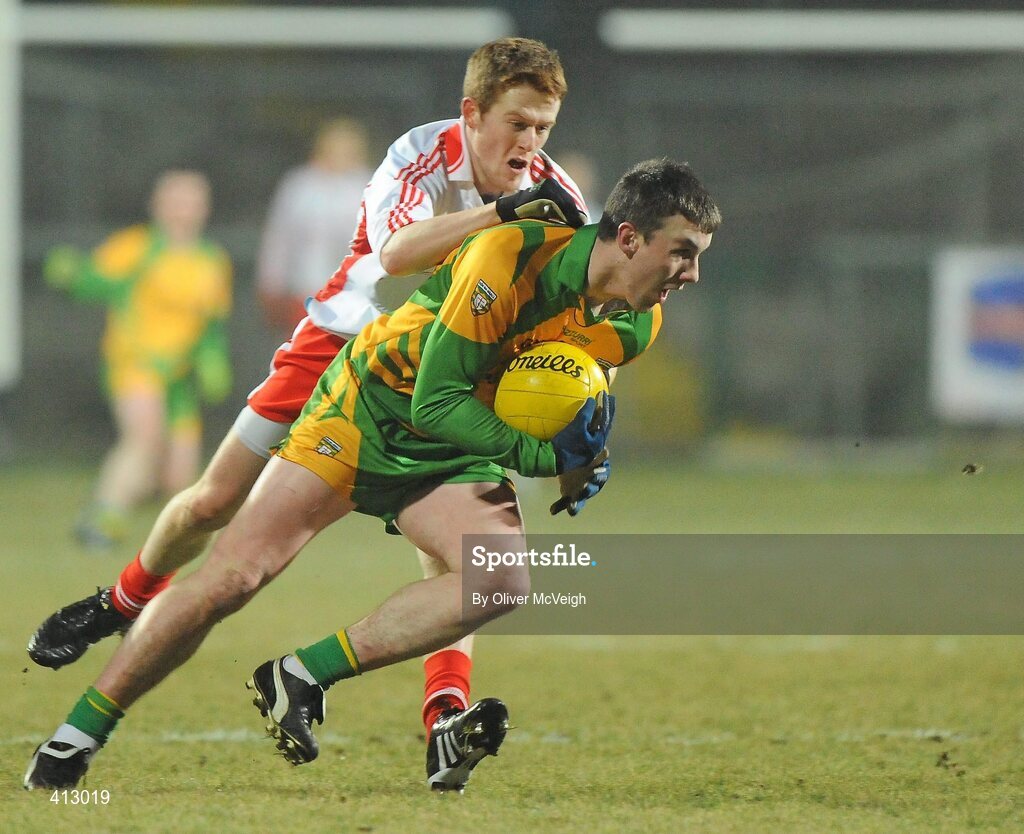 30 January 2010; Leo McLoone, Donegal, in action Niall McKenna, Tyrone. Barrett Sports Lighting Dr. McKenna Cup Final, Donegal v Tyrone, Brewster Park, Enniskillen, Co. Fermanagh. Picture credit: Oliver McVeigh / SPORTSFILE *** Local Caption ***