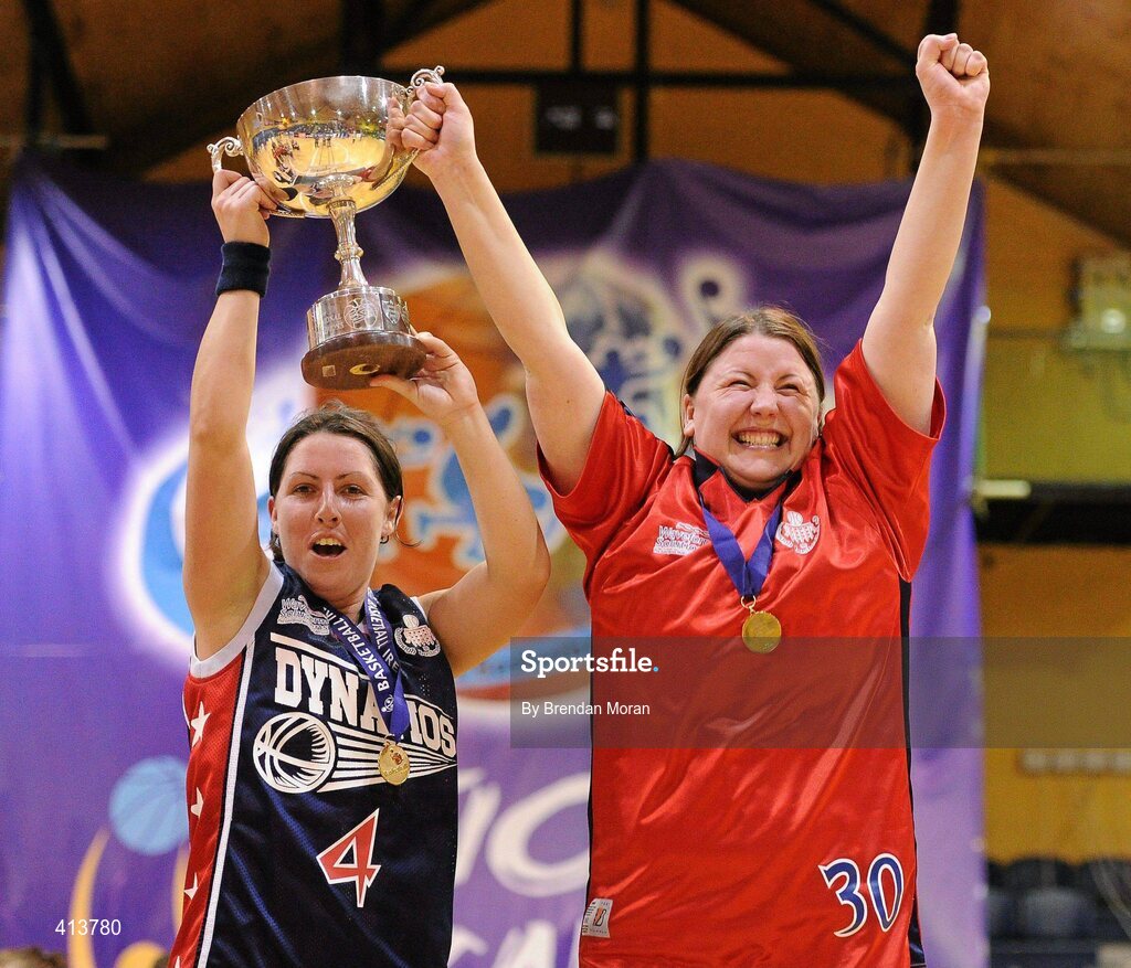 27 March 2010; Oblate Dynamos co-captains Georgina McKanna, left, and Lynn McLoughlin lift the cup after the game. Basketball Ireland Women’s Division One Final, Oblate Dynamos, Dublin v Scruffy St Paul's, Killarney, Co. Kerry, National Basketball Arena, Tallaght, Dublin. Picture credit: Brendan Moran / SPORTSFILE