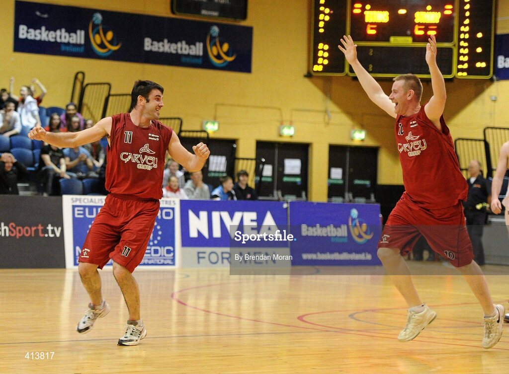 27 March 2010; Team Garvey St Mary's players John Galvin, left, and player/coach Brian Clernon celebrate at the final buzzer. Basketball Ireland Men’s Division One Final, Titans, Galway v Team Garvey St Mary's, Castleisland, Co. Kerry, National Basketball Arena, Tallaght, Dublin. Picture credit: Brendan Moran / SPORTSFILE