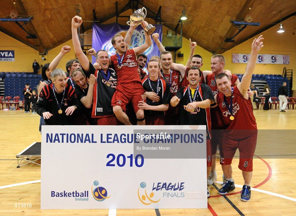 27 March 2010; The Team Garvey St Mary's team celebrate with the cup after the game. Basketball Ireland Men’s Division One Final, Titans, Galway v Team Garvey St Mary's, Castleisland, Co. Kerry, National Basketball Arena, Tallaght, Dublin. Picture credit: Brendan Moran / SPORTSFILE