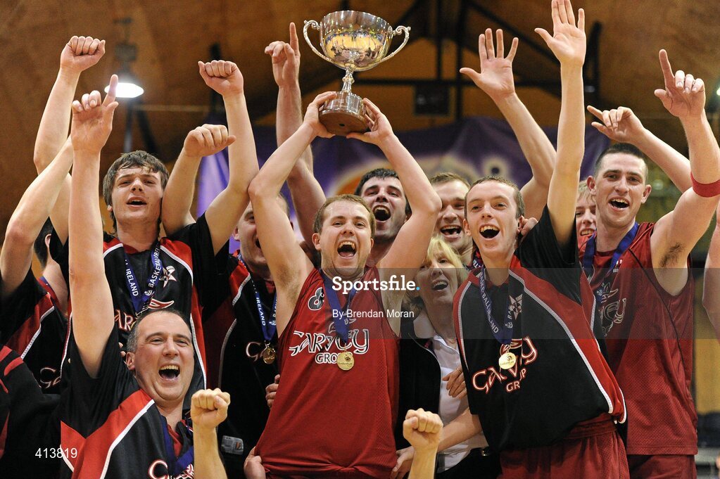 27 March 2010; Team Garvey St Mary's captain Declan Wall, 8, and team-mates celebrate with the cup after a last gasp victory over Titans. Basketball Ireland Men’s Division One Final, Titans, Galway v Team Garvey St Mary's, Castleisland, Co. Kerry, National Basketball Arena, Tallaght, Dublin. Picture credit: Brendan Moran / SPORTSFILE