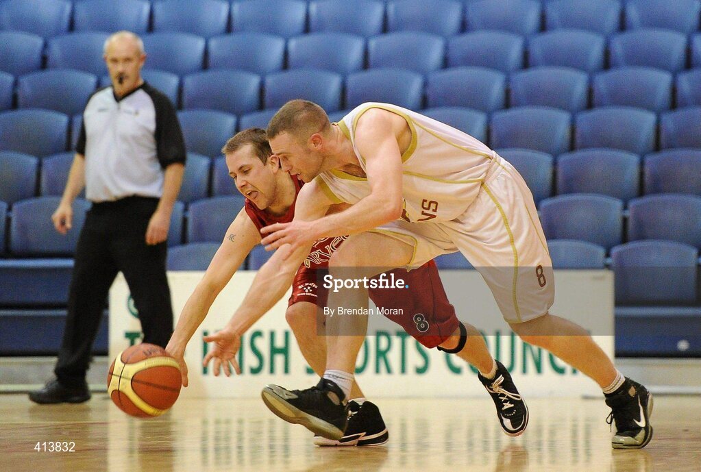 27 March 2010; Declan Wall, Team Garvey St Mary's, and Sean Carroll, Titans, contest a loose ball. Basketball Ireland Men’s Division One Final, Titans, Galway v Team Garvey St Mary's, Castleisland, Co. Kerry, National Basketball Arena, Tallaght, Dublin. Picture credit: Brendan Moran / SPORTSFILE