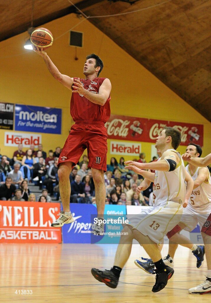 27 March 2010; John Galvin, Team Garvey St Mary's, goes for a lay-up against Rimvydas Visockas, Titans. Basketball Ireland Men’s Division One Final, Titans, Galway v Team Garvey St Mary's, Castleisland, Co. Kerry, National Basketball Arena, Tallaght, Dublin. Picture credit: Brendan Moran / SPORTSFILE