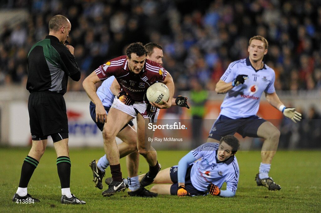 27 March 2010; Joe Bergin, Galway, in action against Hugh Gill, 5, Cian O'Sullivan and Paul Flynn, Dublin. Allianz GAA Football National League, Division 1, Round 6, Dublin v Galway, Parnell Park, Dublin. Picture credit: Ray McManus / SPORTSFILE